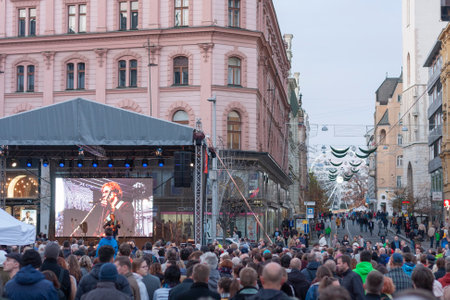 Brno, Czech Republic - November 17, 2019: The stage and  people are listening music on  celebration 30 years of Velvet Revolution at Liberty Square on November 17, 2019 Brno, Czech Republicのeditorial素材