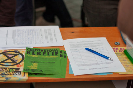 Brno, Czech Republic - November 17, 2019: Leaflets of Activists of Extinction Rebellion  on celebration 30 years of Velvet Revolution at Liberty Square on November 17, 2019 Brno, Czech Republicのeditorial素材