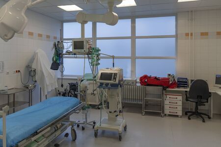 Emergency reception, transportation trolley, medical ventilator and monitor in ICU in hospital, a...