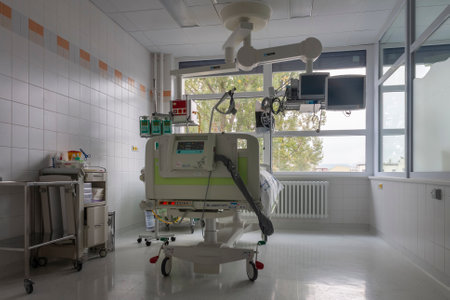 Svitavy, Czech Republic -September 21, 2017: Isolation box in intensive care unit in hospital, bed with monitors, a place where can be  treated patients with pneumonia caused by coronavirus covid 19.のeditorial素材