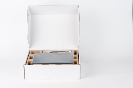 Paper box, inside wifi router, wireless device with three antennas on white background.の写真素材