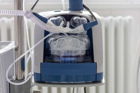 High-flow oxygen device in ICU in hospital. High-flow oxygen therapy is a non-invasive respiratory support for patients with pneumonia causedの写真素材
