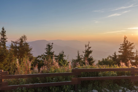 View of the landscape, Beskid mountains  from peak of Lysa hora in sunset time.の写真素材