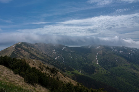 Mountains Hromove, Chleb, Velky Krivan, national park Mala Fatra, Slovakia, spring cloudy day.の写真素材