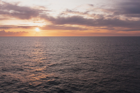 Sun set view on oceanの写真素材