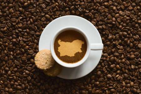 Still life photography of hot coffee beverage with map of Bulgariaの写真素材