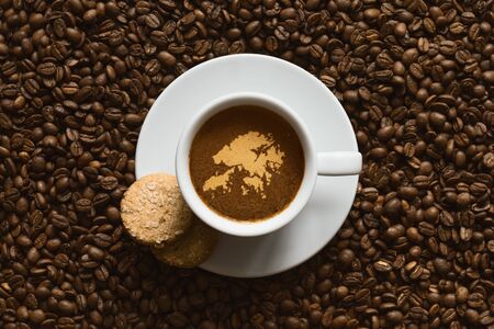 Still life photography of hot coffee beverage with map of Hong Kongの写真素材
