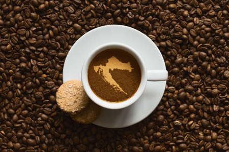 Still life photography of hot coffee beverage with map of Croatiaの写真素材