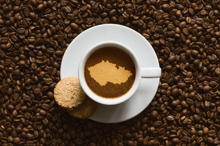 Still life photography of hot coffee beverage with map of Czech Republicの写真素材