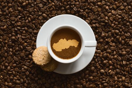 Still life photography of hot coffee beverage with map of Slovakiaの写真素材