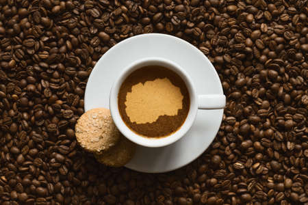 Still life photography of hot coffee beverage with map of Macedoniaの写真素材