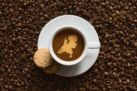 Still life photography of hot coffee beverage with map of Netherlandsの写真素材