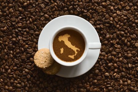 Still life photography of hot coffee beverage with map of Italyの写真素材