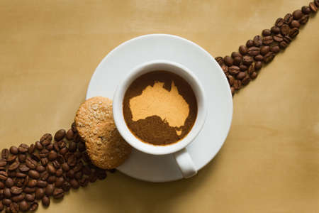 Still life photography of hot coffee beverage with map of Australiaの写真素材