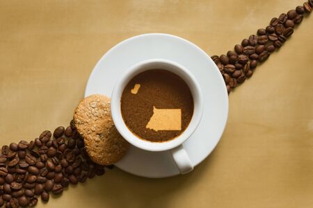 Still life photography of hot coffee beverage with map of Equatorial Guineaの写真素材