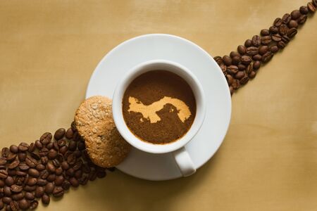 Still life photography of hot coffee beverage with map of Panamaの写真素材