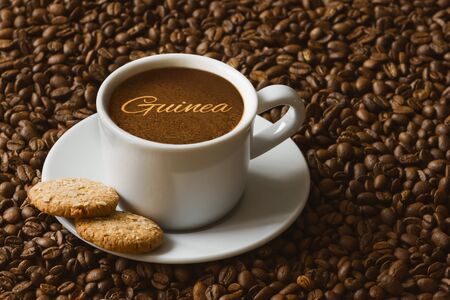 Still life photography of hot coffee beverage with text Guineaの写真素材