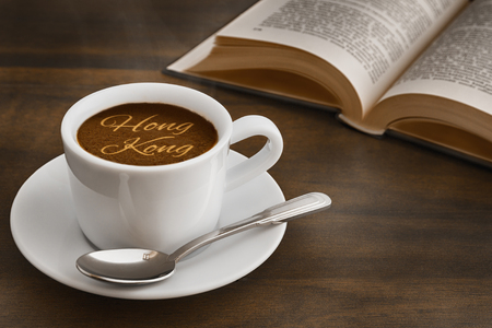 Still life photography of hot coffee beverage with text Hong Kongの写真素材