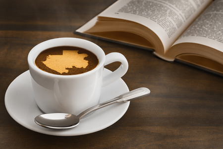 Still life photography of hot coffee beverage with map of Gabonの写真素材