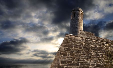  Old Fortress with cloudy sky in the backgroundの写真素材