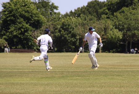 Cricket player batsman runs to score on Saturday Jan. 15,2011 at  Pakuranga Cricket Club in Auckland, New Zealandのeditorial素材