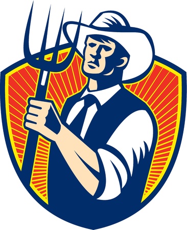 Illustration of cowboy organic farmer with pitchfork facing front set inside shield done in retro woodcut styleのイラスト素材