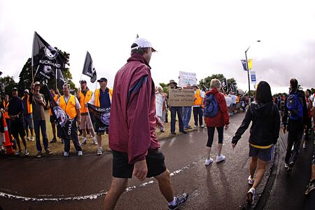 AUCKLAND- Mar. 14: Union members and protesters carrying signs and placards picket against Ports Authority in Auckland, New Zealand on Sunday March 14, 2010.のeditorial素材