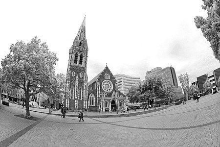 CHRISTCURCH-Dec. 7: Tourist and pedestrians walk by Christchurch Cathedral, an Anglican church in the Cathedral Square taken on Dec. 7, 2010 in Christchurch, New Zealand.のeditorial素材