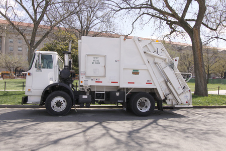 WASHINGTON D.C., OCT. 4: Garbage rubbish truck with rear end loader parked in Washington D.C.,...