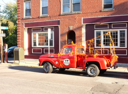 SALEM, OCT. 8: 1950s Ford F100 pickup truck parked on the side of street in Salem, Massachusetts,...