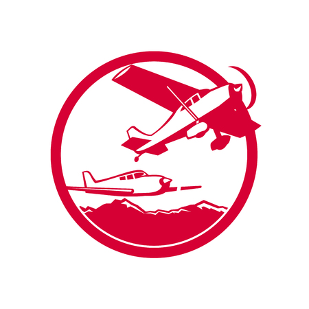 Retro style illustration of two Fixed Wing Aircraft Taking Off with mountains in background set inside Circle on isolated background.のイラスト素材