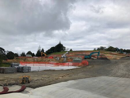 AUCKLAND, Jan.26- Mechanical diggers and excavators at work on a construction site taken on Friday,...