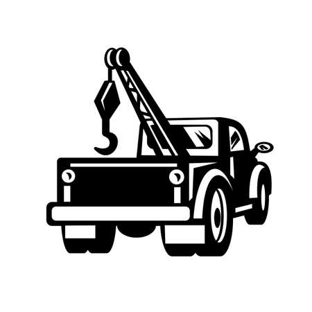 Black and white illustration of a vintage tow truck or wrecker pick-up truck lorry viewed from rear done in retro style.のイラスト素材