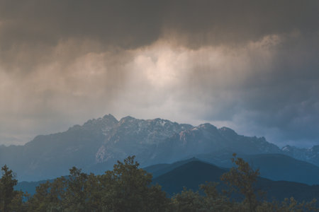 Sunlight through the clouds over the Sierra de Gredos mountain, Candeleda, Avila, Spain.