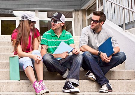 three students on the campus
