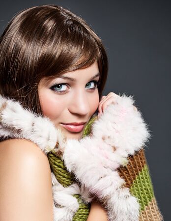 beautiful girl with winter-scarfの写真素材