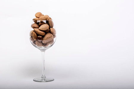 Almonds in the glassの写真素材