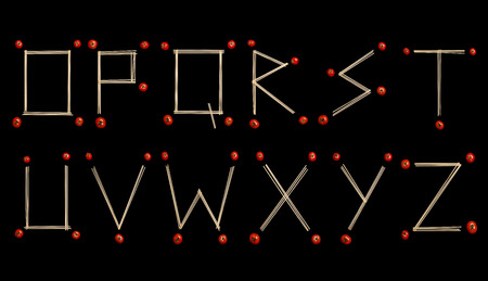 Alphabet from O to Z written with linguine pasta and little tomatoesの写真素材