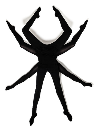 Eight woman legs composing a black spider