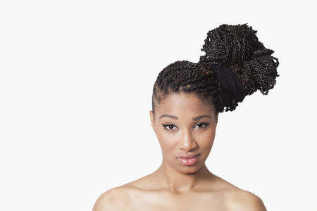 Beautiful model with braids smilingの写真素材