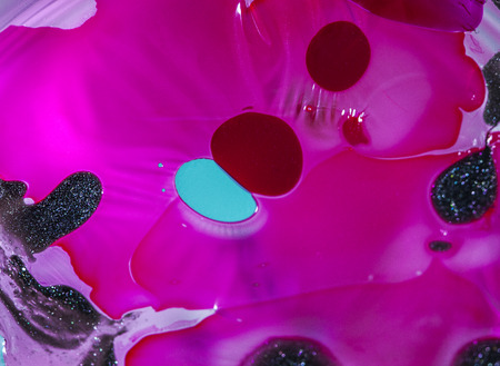 Crazy and colorful nail polish effect in water