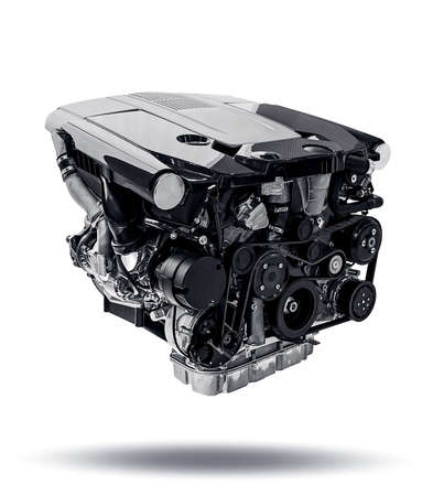 New modern car engine isolated on white background. Automotive industries. Car motor engineの写真素材