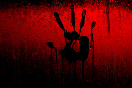 Handprint on a wet glassの写真素材