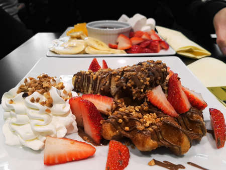 Fondue with hot chocolate and fresh fruit
