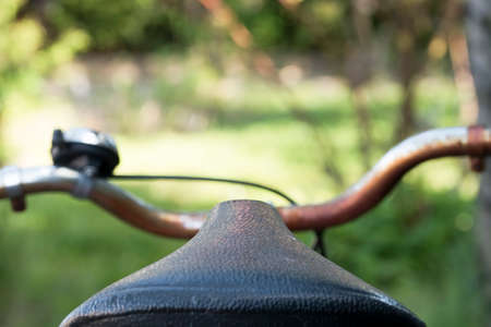 Old bicycle rear wheel with lightの写真素材