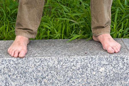 Bare feet of a manの写真素材