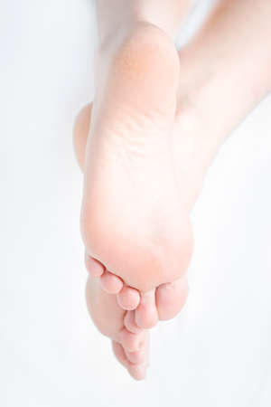 The bare foot of a woman