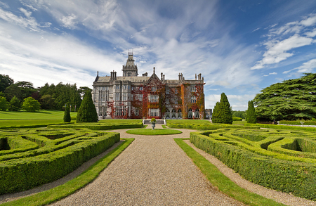 Adare manor in red ivy and gardens in Irelandのeditorial素材