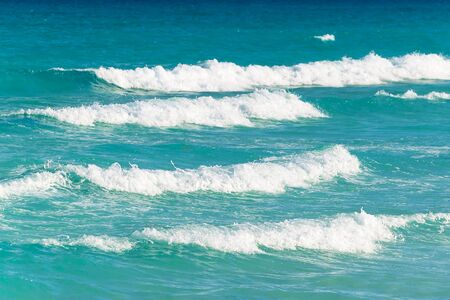 Waves on the Caribbean Sea in Mexicoの写真素材