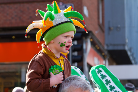 Child with an Irish hat participates in a parade for St. Patrick's Dayのeditorial素材